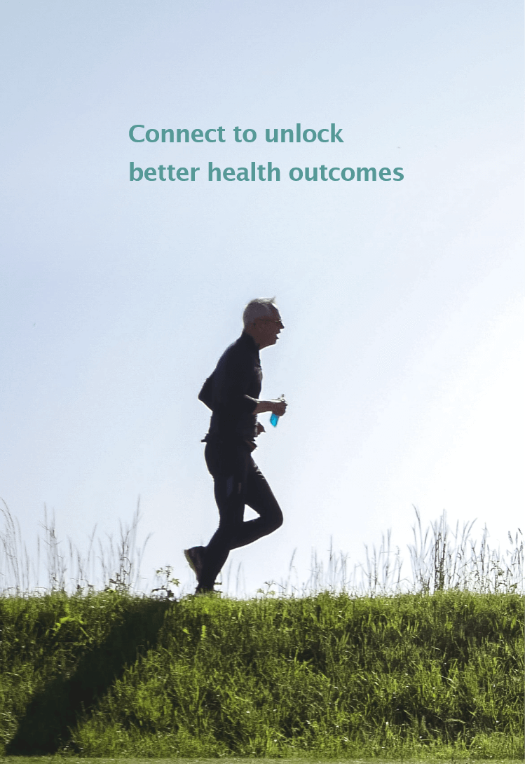 Connect to unlock better health outcomes - A man is jogging on the grass.